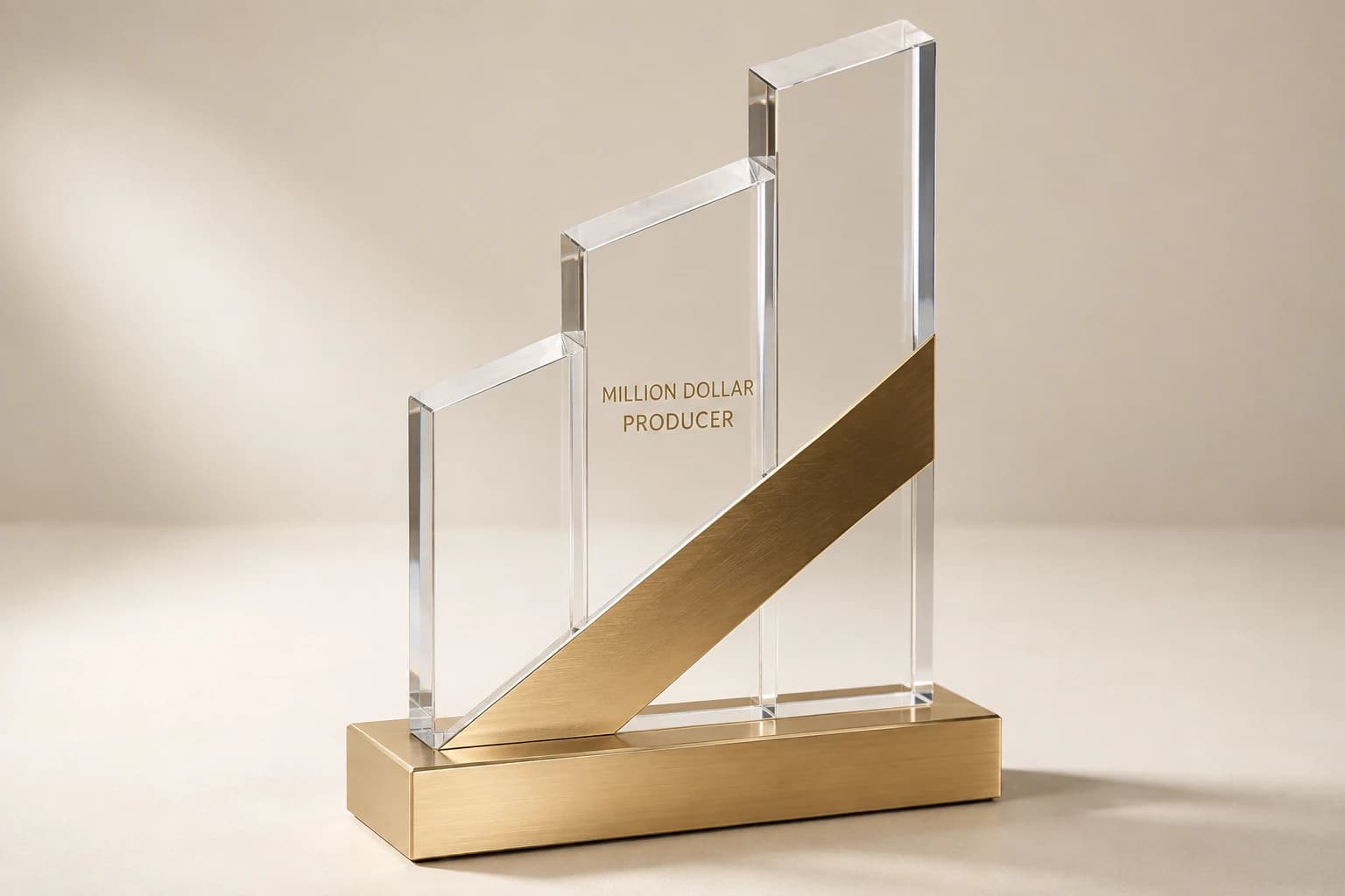 Stepped clear acrylic producer award with a rising gold-tone metal inlay.